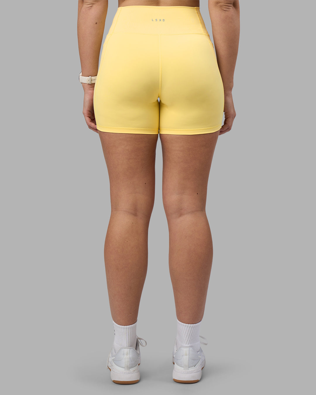 Woman wearing Fusion Ultra High-Rise 6" Short Pockets - Lemon | Model:Amy | Size:M - view 4