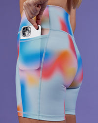 Woman wearing Fusion Ultra High-Rise 6" Short Pockets - Rainbow Shade | Set:true | Angle:closeup | Model:Mon | Size:M | Thumbnail Index: 5