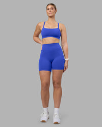 Woman wearing Fusion Ultra High-Rise 6" Short - Power Cobalt | Model:Amy | Size:M | Thumbnail Index: 4