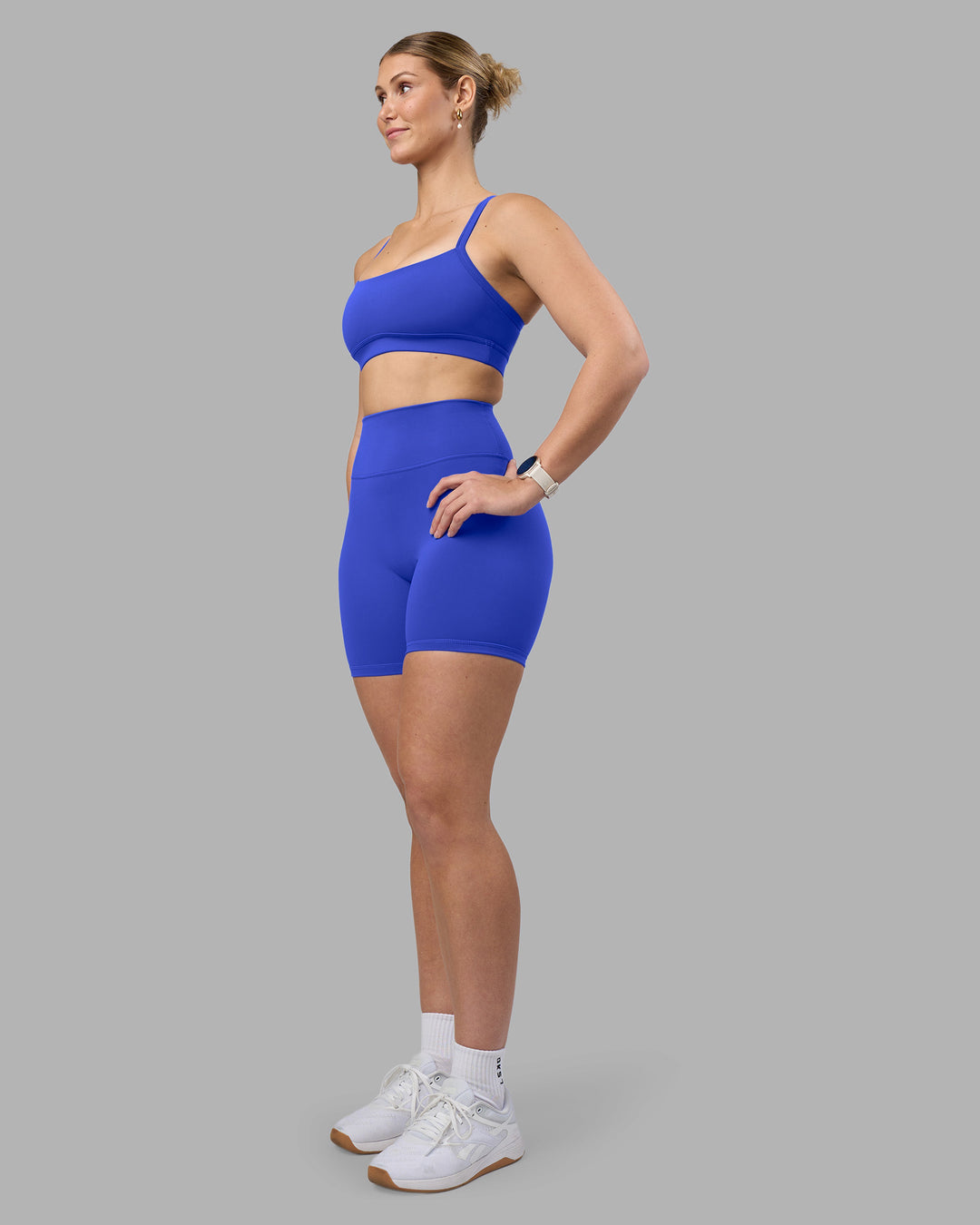 Woman wearing Fusion Ultra High-Rise 6" Short - Power Cobalt | Model:Amy | Size:M - view 2