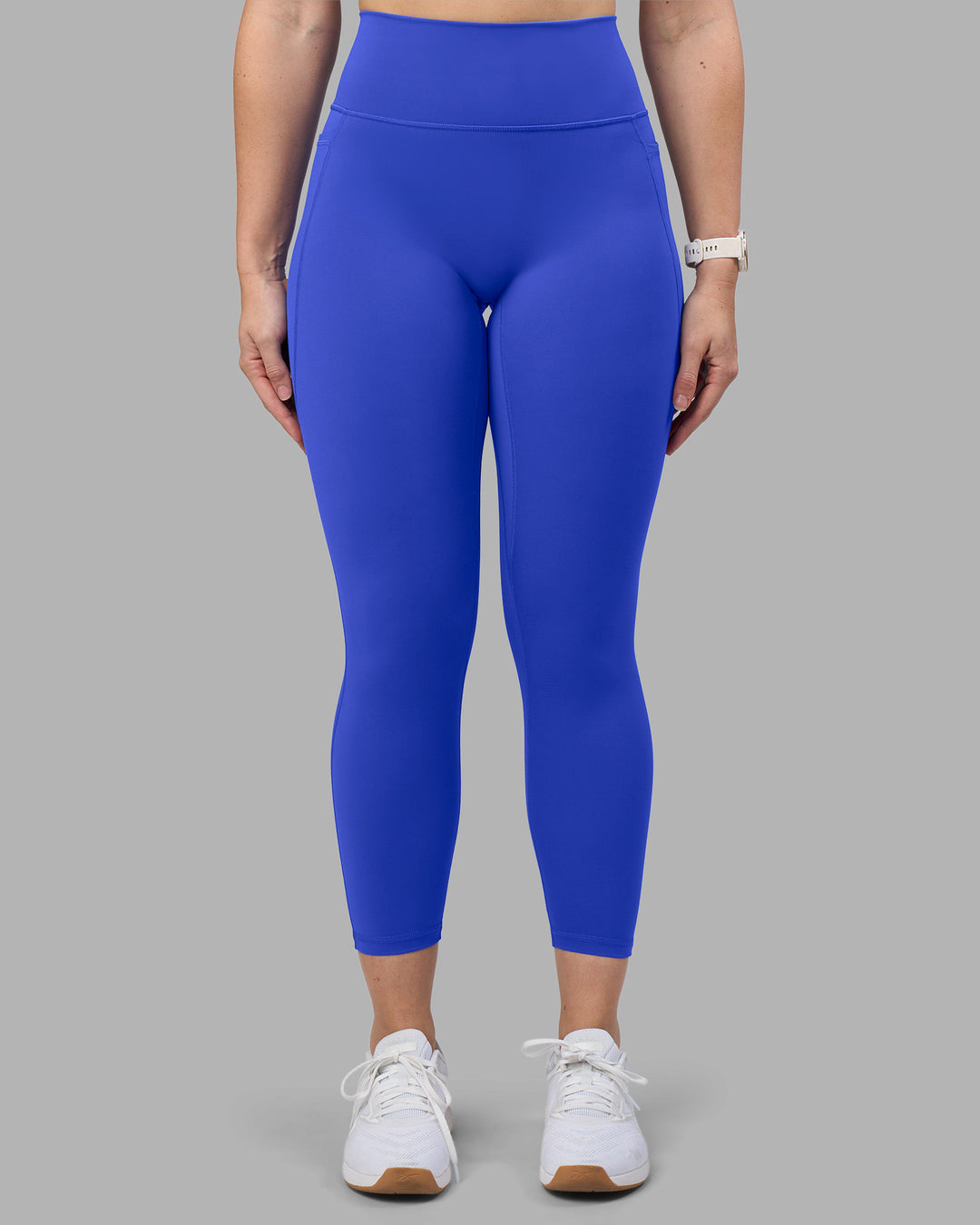 Woman wearing Fusion Ultra High-Rise 7/8 Legging Pockets - Power Cobalt | Model:Amy | Size:M - view 7