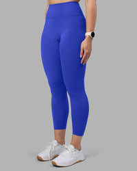 Woman wearing Fusion Ultra High-Rise 7/8 Legging Pockets - Power Cobalt | Model:Amy | Size:M | Thumbnail Index: 0