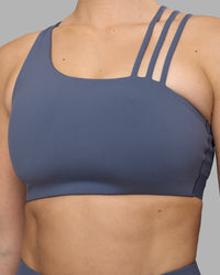 Woman wearing Galvanise Sports Bra 2.0 - Night Shadow | Set:true | Angle:closeup | Model:Amy | Size:M | Thumbnail Index: 3