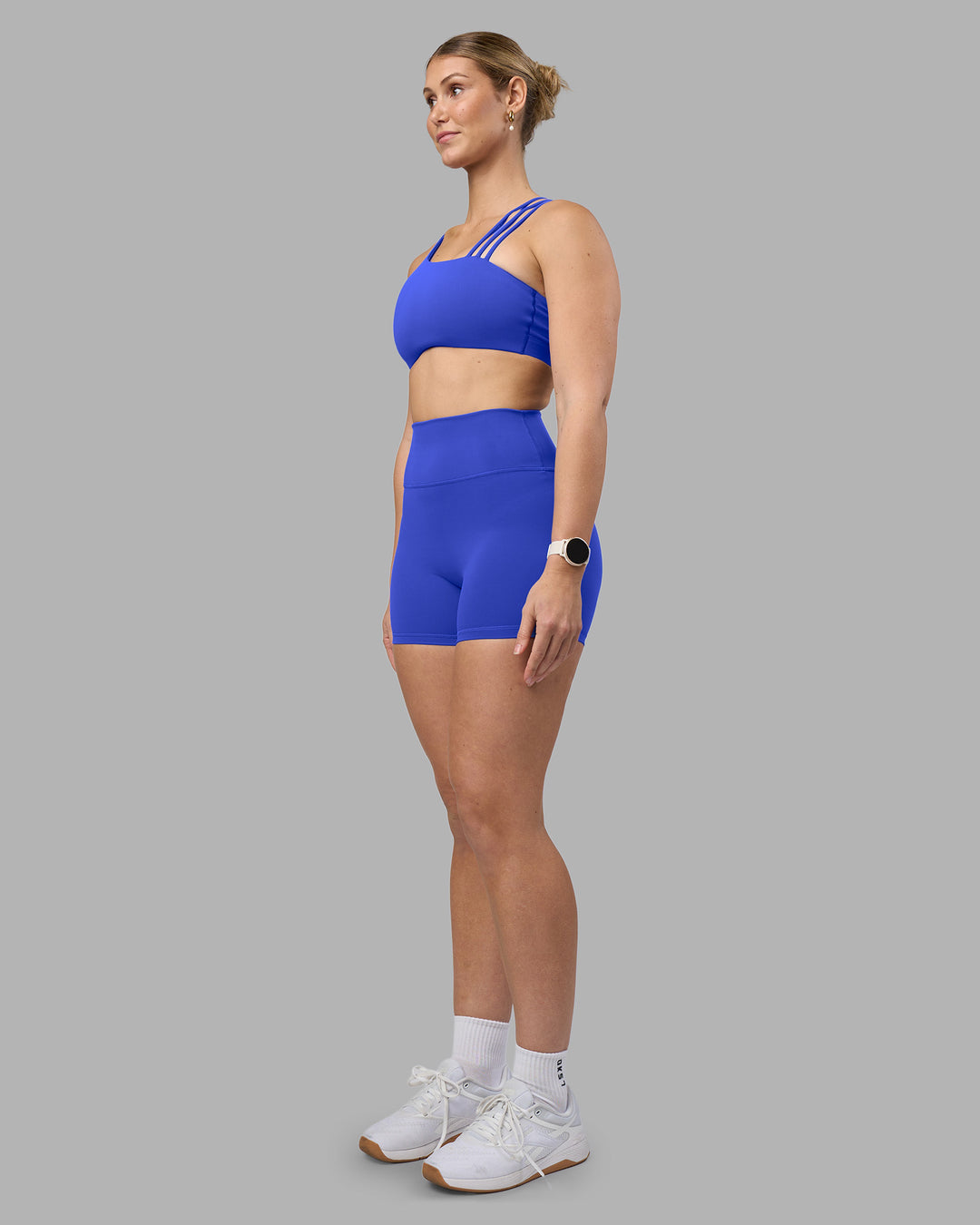 Woman wearing Galvanise Sports Bra 2.0 - Power Cobalt | Model:Amy | Size:M - view 6