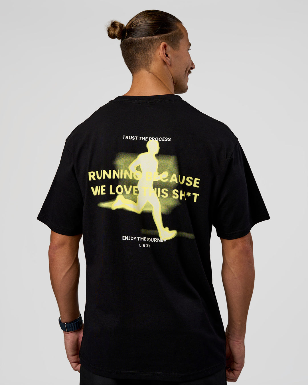 Man wearing High Run FLXCotton Oversized Tee - Black-Yellow Fizz | Model:Jaiden | Size:M - view 3