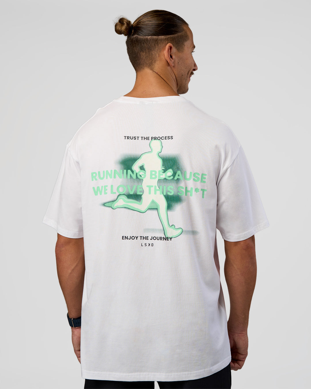 Man wearing High Run FLXCotton Oversized Tee - White-Jelly Mint | Model:Jaiden | Size:M - view 2