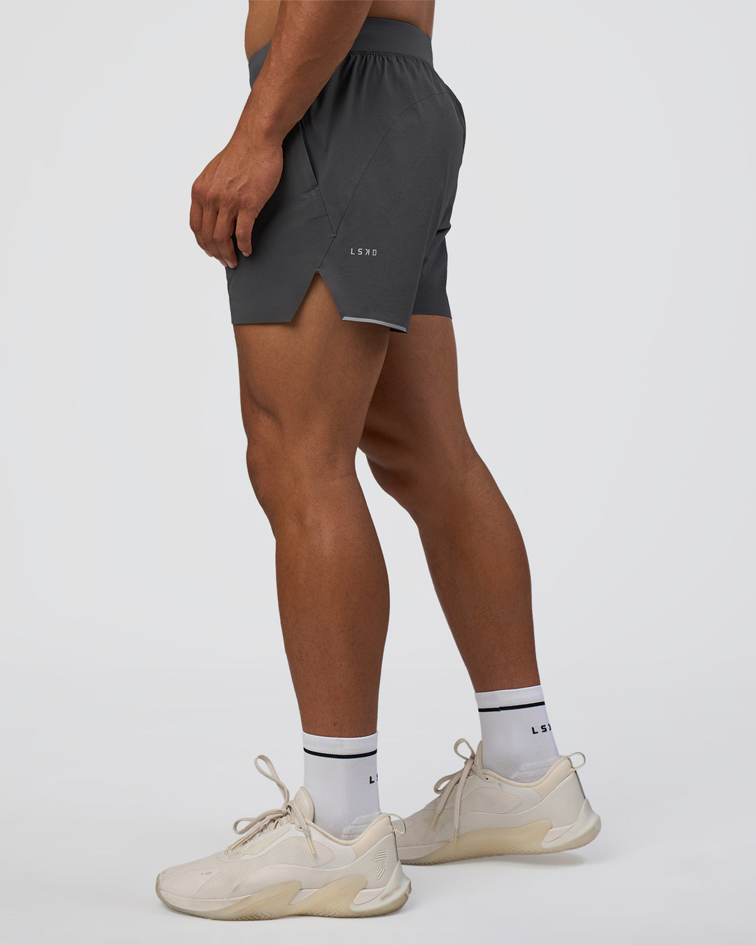 Man wearing Hybrid 5" Short - Dark Storm | Model:Daarian | Size:M - view 6