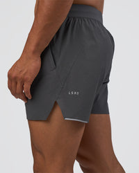 Man wearing Hybrid 5" Short - Dark Storm | Model:Daarian | Size:M | Thumbnail Index: 0
