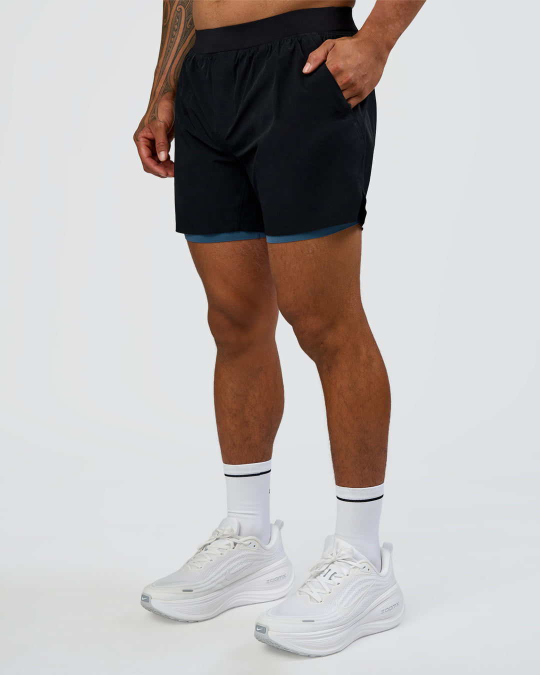 Man wearing Hybrid Lined 5" Short - Black-Indigo | Model:Daarian | Size:M - view 8