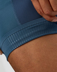 Man wearing Hybrid Lined 5" Short - Black-Indigo | Model:Daarian | Size:M | Thumbnail Index: 5