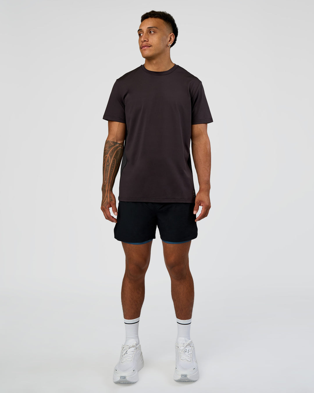 Man wearing Hybrid Lined 5" Short - Black-Indigo | Model:Daarian | Size:M - view 7