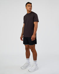 Man wearing Hybrid Lined 5" Short - Black-Indigo | Model:Daarian | Size:M | Thumbnail Index: 2