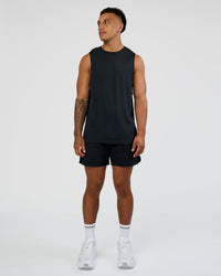 Man wearing Hybrid Lined 5" Short - Black-Shale Beige | Model:Daarian | Size:M | Thumbnail Index: 2