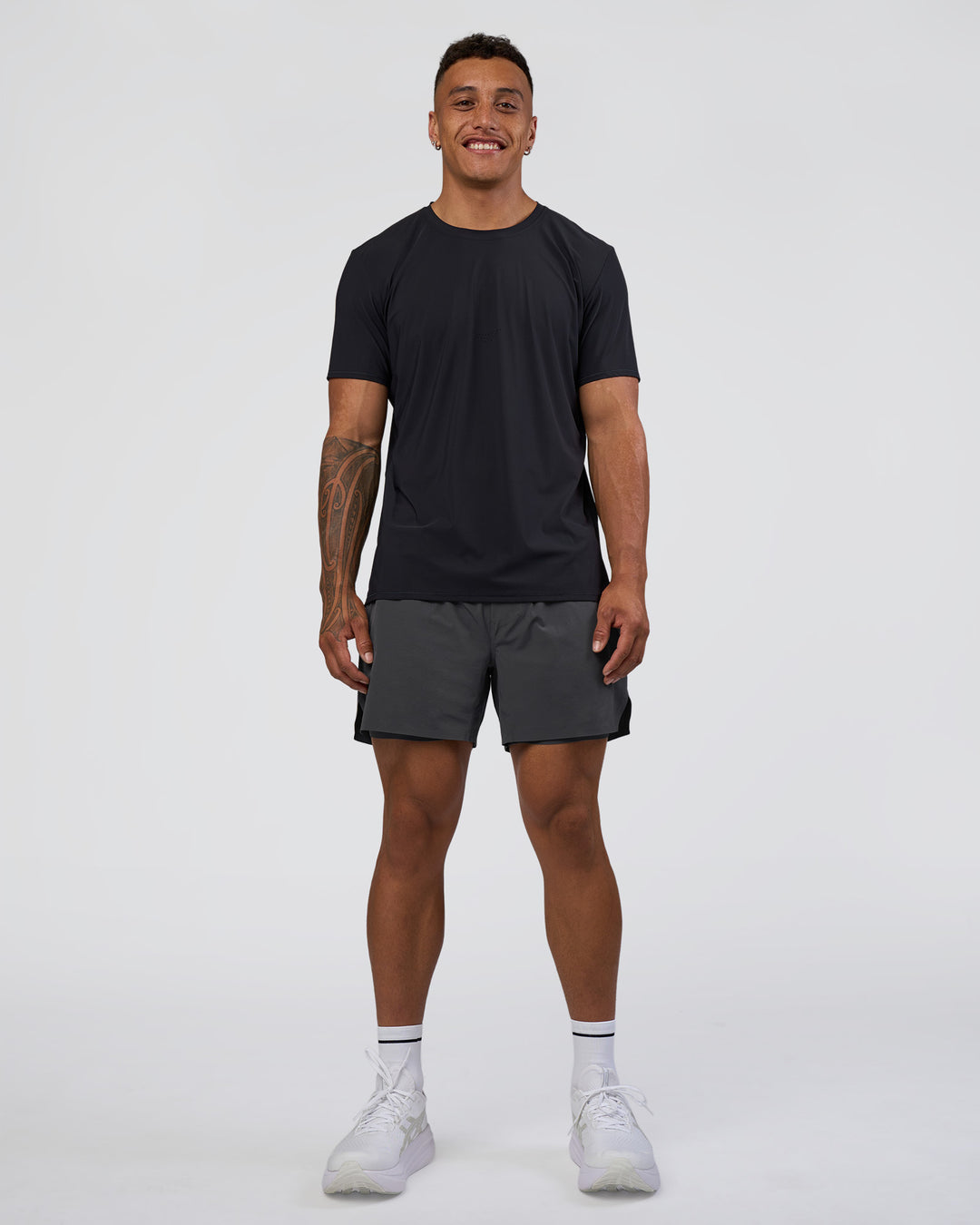 Man wearing Hybrid Lined 5" Short - Dark Storm | Model:Daarian | Size:M - view 6