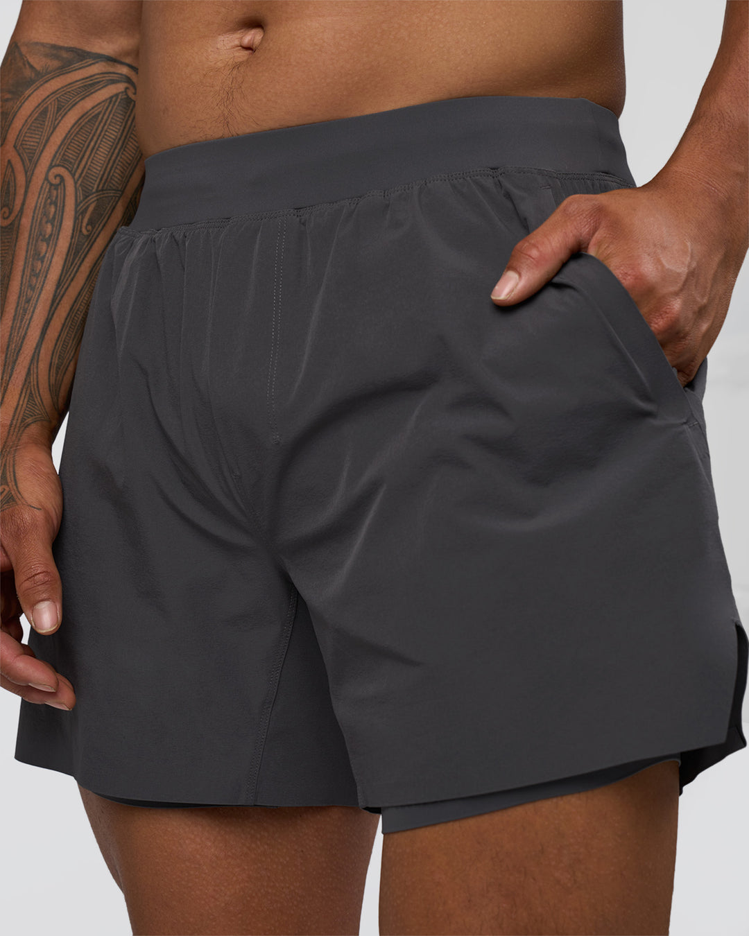 Man wearing Hybrid Lined 5" Short - Dark Storm | Model:Daarian | Size:M - view 5
