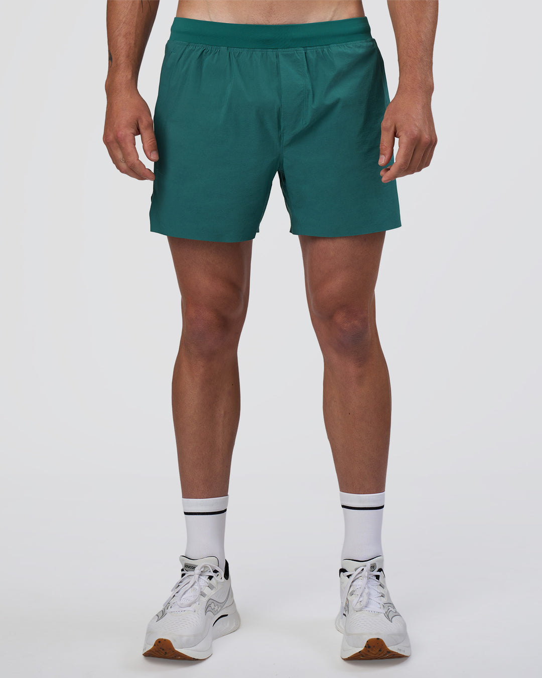Man wearing Hybrid Lined 5" Short - Transformative Teal | Model:Konnor | Size:M - view 1