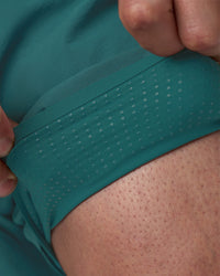 Man wearing Hybrid Lined 5" Short - Transformative Teal | Model:Konnor | Size:M | Thumbnail Index: 4