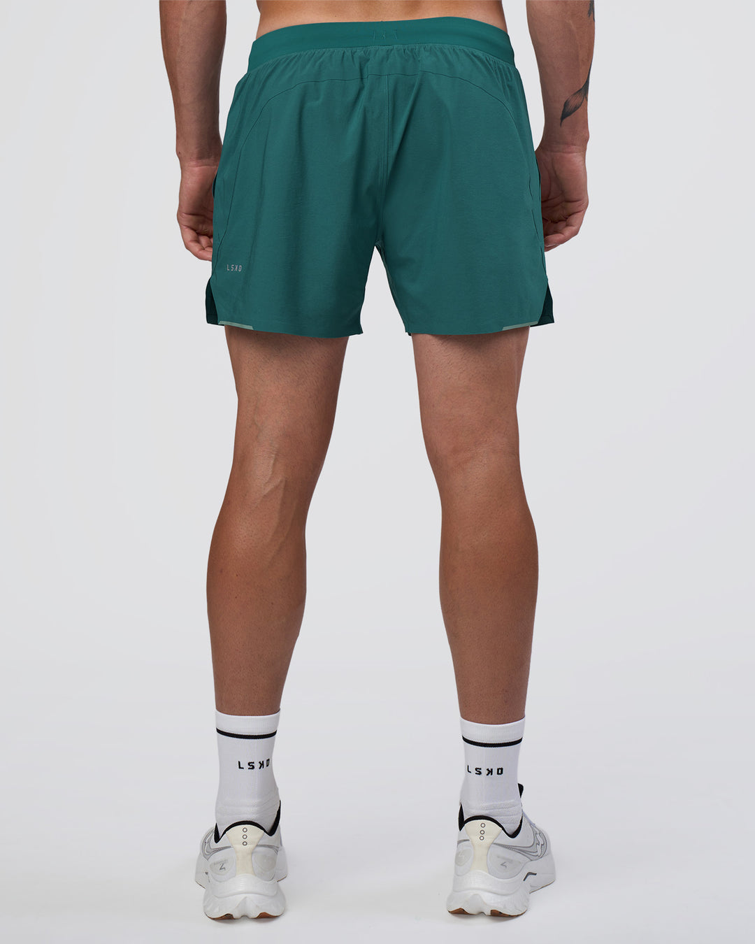 Man wearing Hybrid Lined 5" Short - Transformative Teal | Model:Konnor | Size:M - view 4