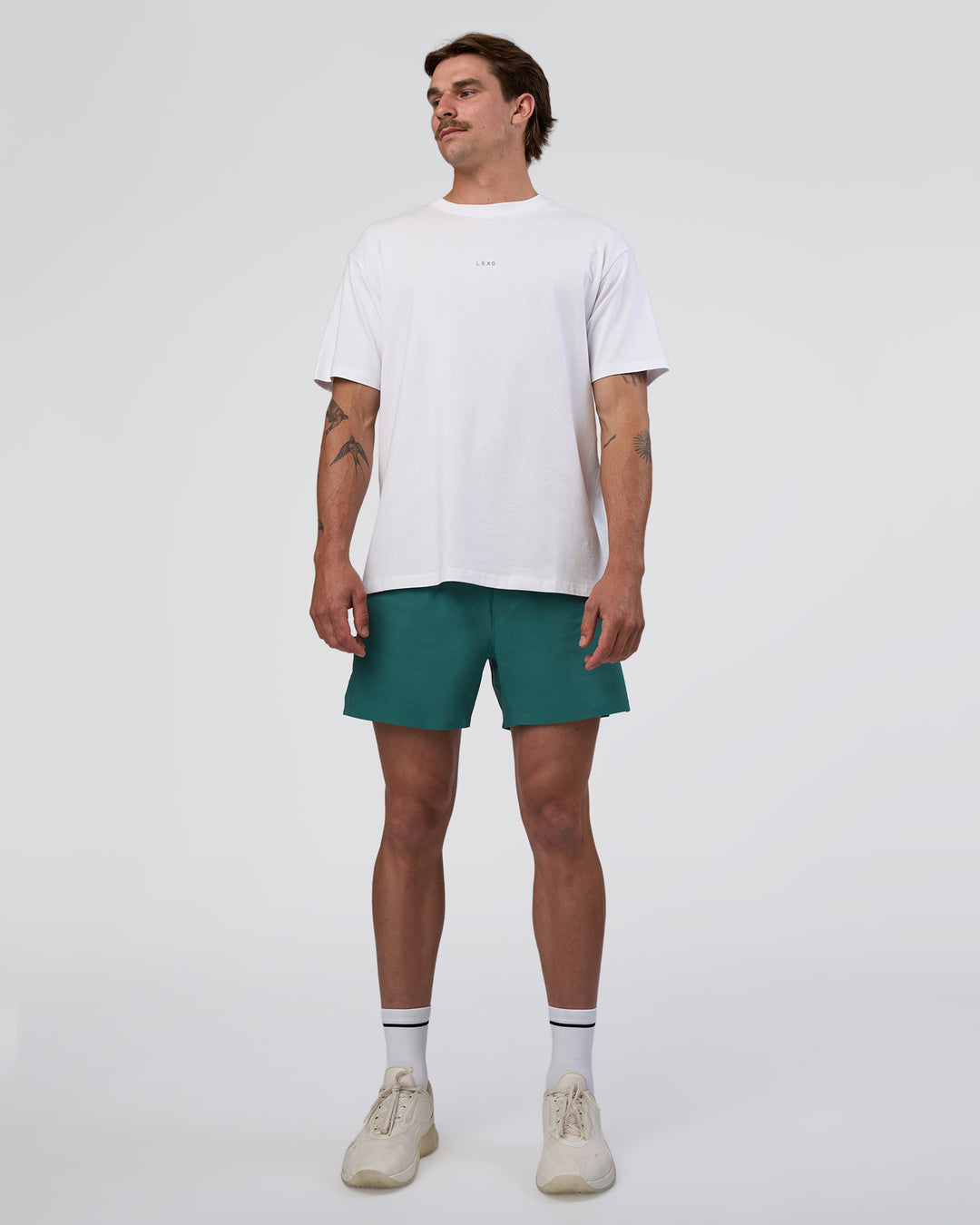 Man wearing Hybrid Lined 5" Short - Transformative Teal | Model:Konnor | Size:M - view 8