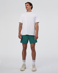 Man wearing Hybrid Lined 5" Short - Transformative Teal | Model:Konnor | Size:M | Thumbnail Index: 7