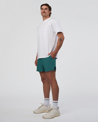 Man wearing Hybrid Lined 5" Short - Transformative Teal | Model:Konnor | Size:M | Thumbnail Index: 2