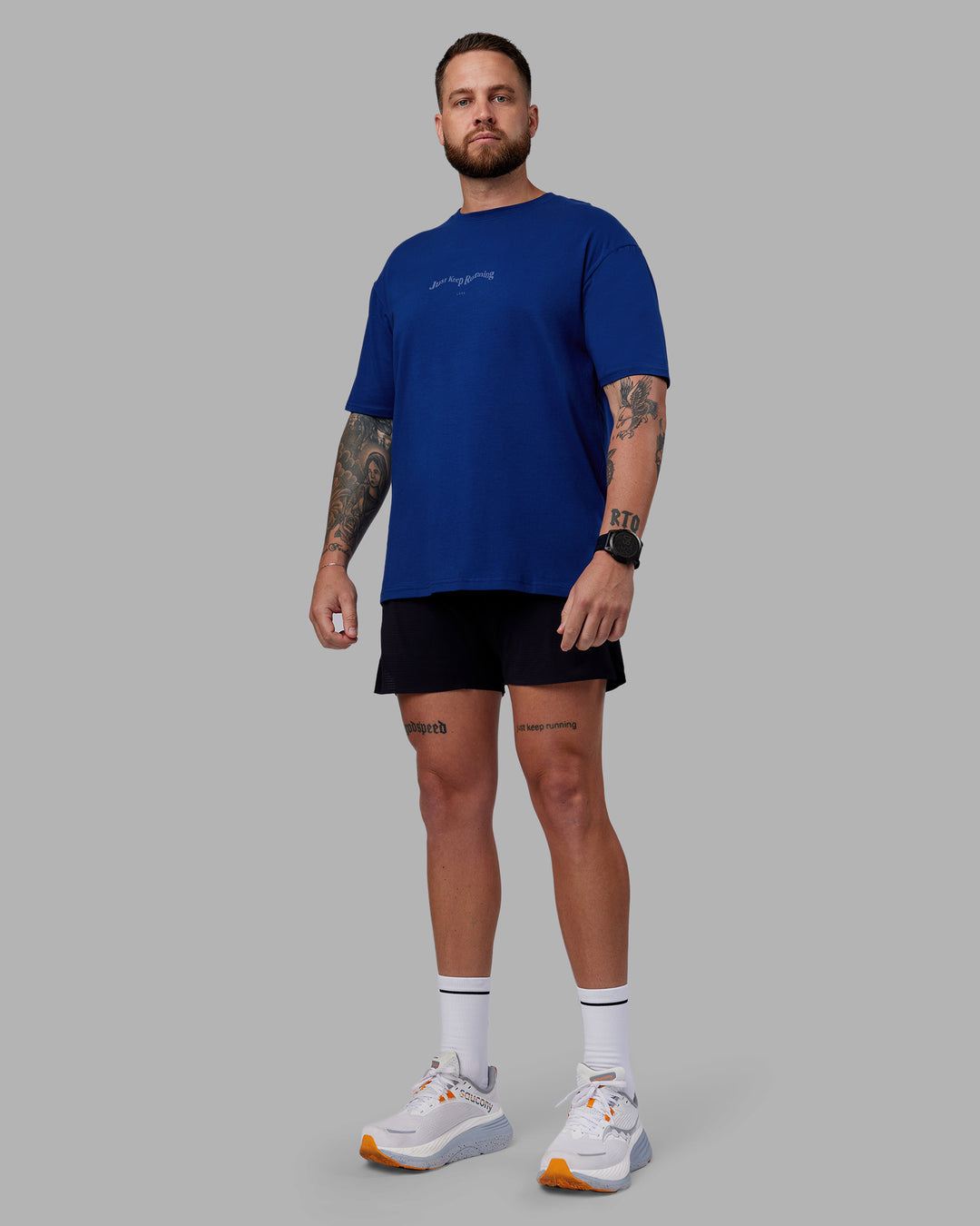 Man wearing Just Run FLXCotton Oversized Tee - Midnight Blue-Light Blue | Model:Macca | Size:M - view 6