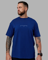 Man wearing Just Run FLXCotton Oversized Tee - Midnight Blue-Light Blue | Model:Macca | Size:M | Thumbnail Index: 3