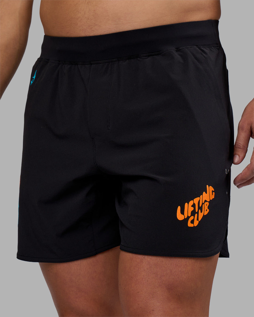 Man wearing Lift 6" Short - Black-Blue Atoll | Model:Jaiden | Size:M - view 3