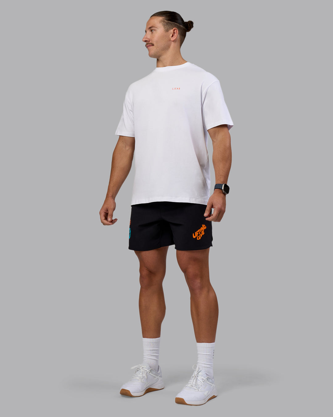 Man wearing Lift 6" Short - Black-Blue Atoll | Model:Jaiden | Size:M - view 5