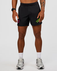 Man wearing Lift 6" Short - Black-Sugar Plum Lime | Model:Malebo | Size:M | Thumbnail Index: 5