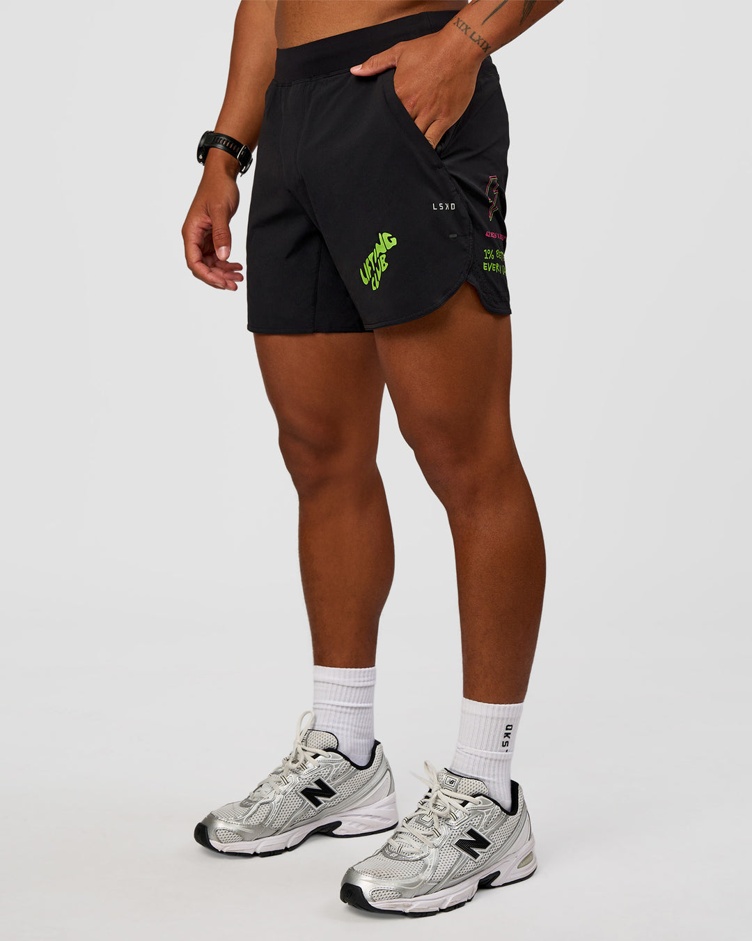 Man wearing Lift 6" Short - Black-Sugar Plum Lime | Model:Malebo | Size:M - view 1