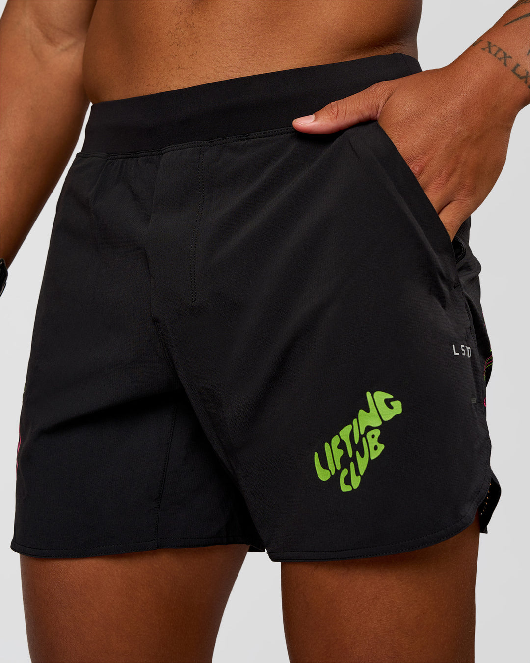 Man wearing Lift 6" Short - Black-Sugar Plum Lime | Model:Malebo | Size:M - view 5