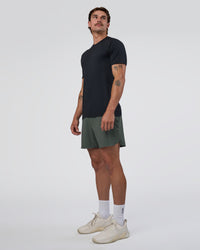 Man wearing Lift 6" Short - Carbon Green | Model:Konnor | Size:M | Thumbnail Index: 4