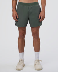 Man wearing Lift 6" Short - Carbon Green | Model:Konnor | Size:M | Thumbnail Index: 1