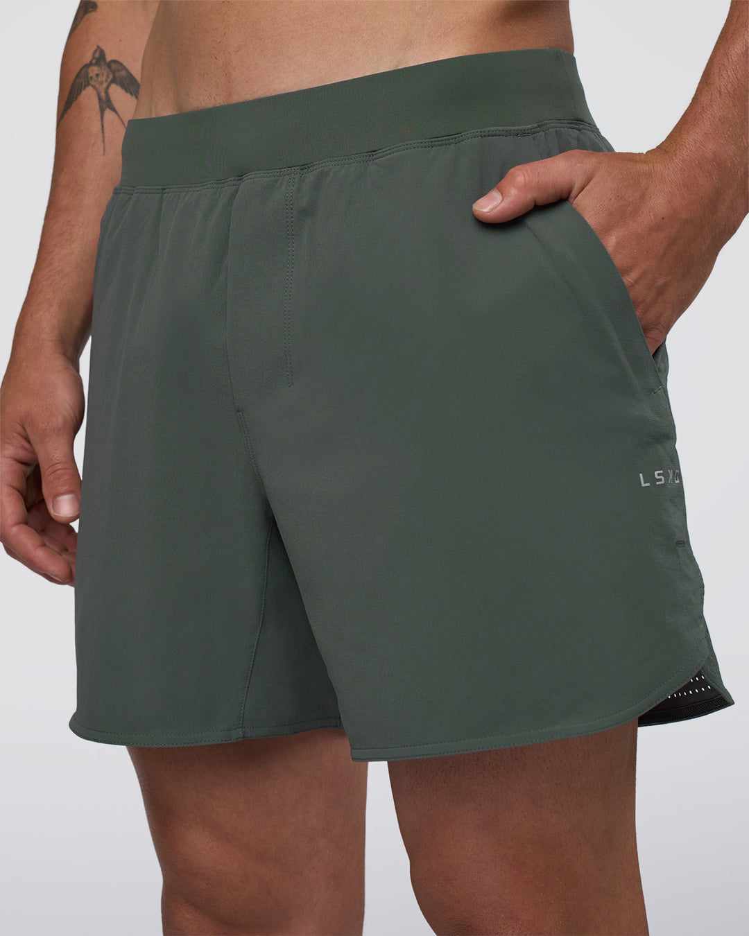 Man wearing Lift 6" Short - Carbon Green | Model:Konnor | Size:M - view 1