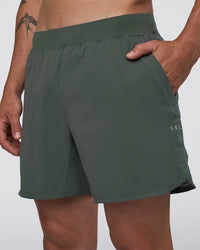 Man wearing Lift 6" Short - Carbon Green | Model:Konnor | Size:M | Thumbnail Index: 0