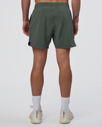 Man wearing Lift 6" Short - Carbon Green | Model:Konnor | Size:M | Thumbnail Index: 3
