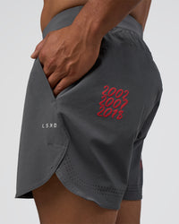 Man wearing Lift 6" Short - Dark Storm-Scarlet | Model:Daarian | Size:M | Thumbnail Index: 0