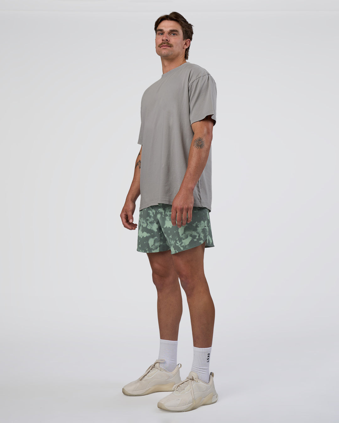 Man wearing Lift 6" Short - Washed Camo Carbon | Model:Konnor | Size:M - view 2