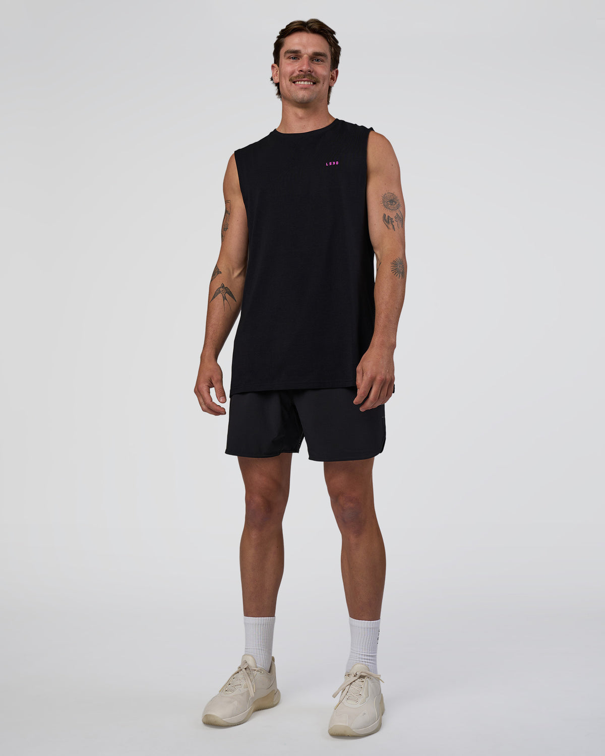 Man wearing Lifting Club FLXCotton Tank - Black-Ultra Fuchsia | Model:Konnor | Size:M