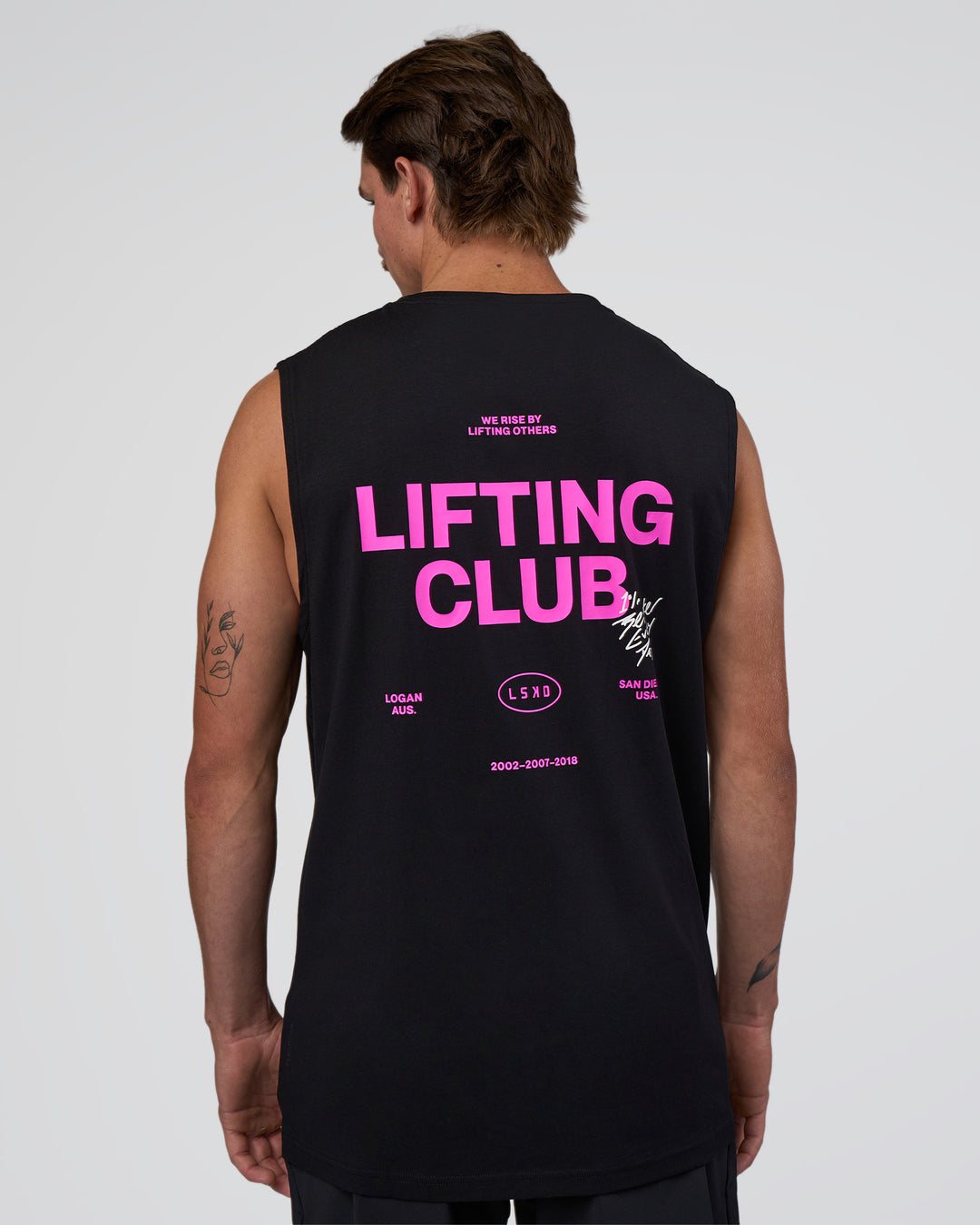 Man wearing Lifting Club FLXCotton Tank - Black-Ultra Fuchsia | Model:Konnor | Size:M - view 1