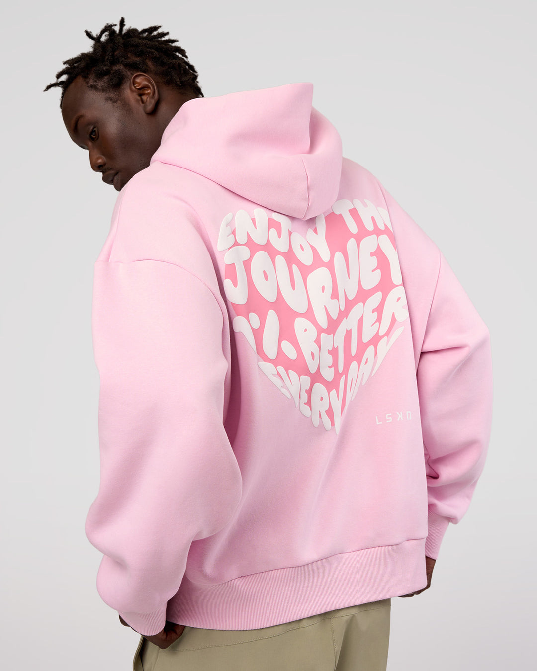 Man wearing Love The Journey Unisex Oversized Hoodie - Marshmallow-White | Model:Okello | Size:M - view 2