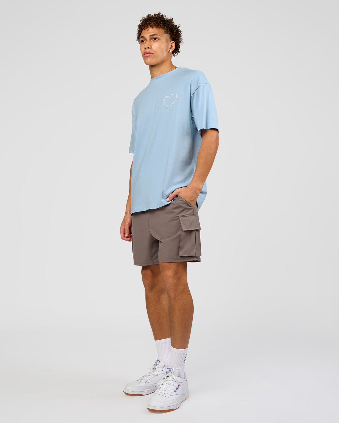 Man wearing Love The Process FLXCotton Oversize Tee - Open Air-Off White | Model:Leandro | Size:M - view 6