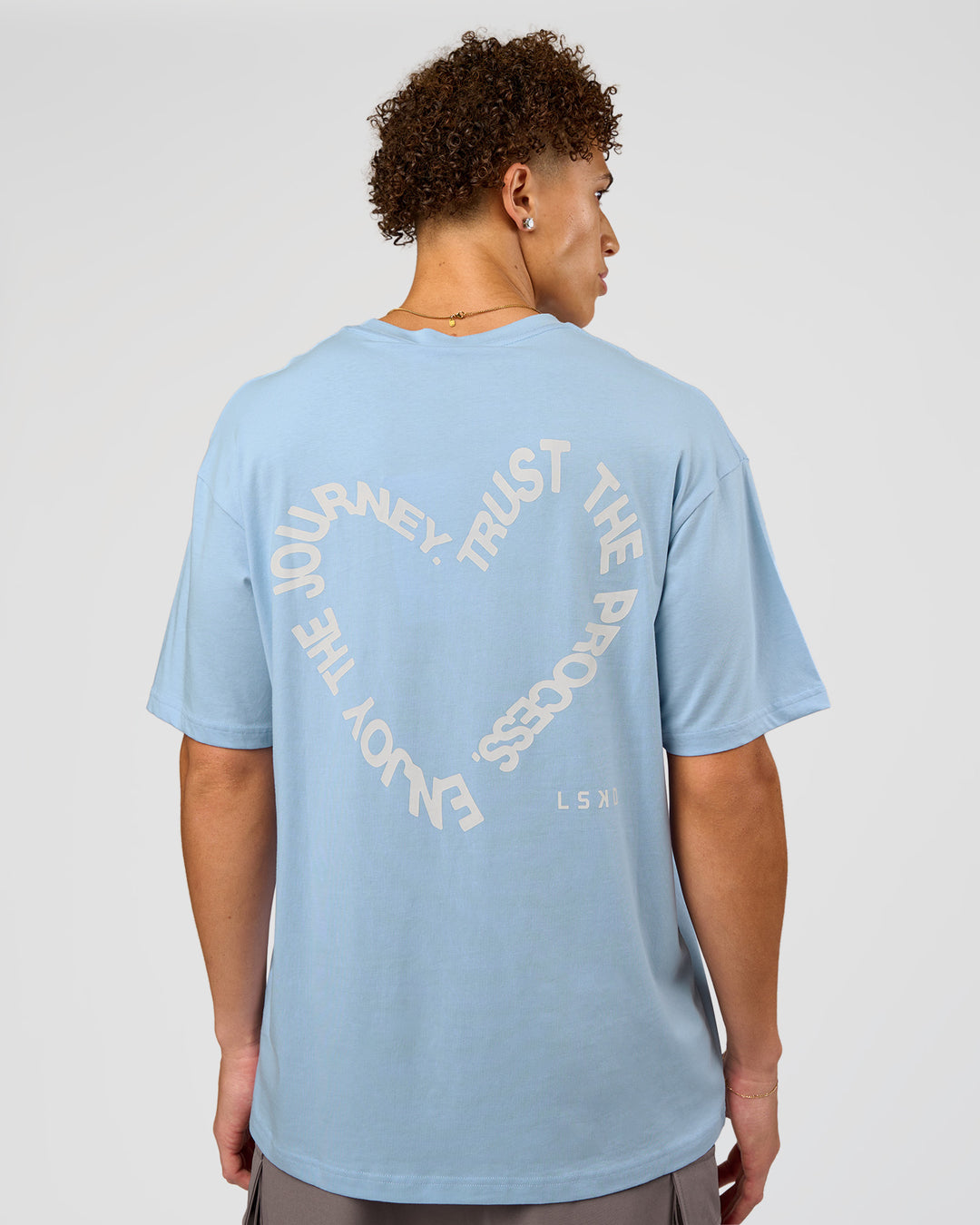 Man wearing Love The Process FLXCotton Oversize Tee - Open Air-Off White | Model:Leandro | Size:M - view 2
