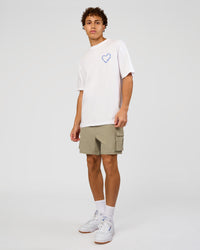 Man wearing Love The Process FLXCotton Oversize Tee - White-Electric Indigo | Model:Leandro | Size:M | Thumbnail Index: 5
