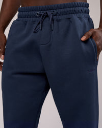 Man wearing MVP Cuffed Track Pant - Future Navy | Model:Okello | Size:M | Thumbnail Index: 2