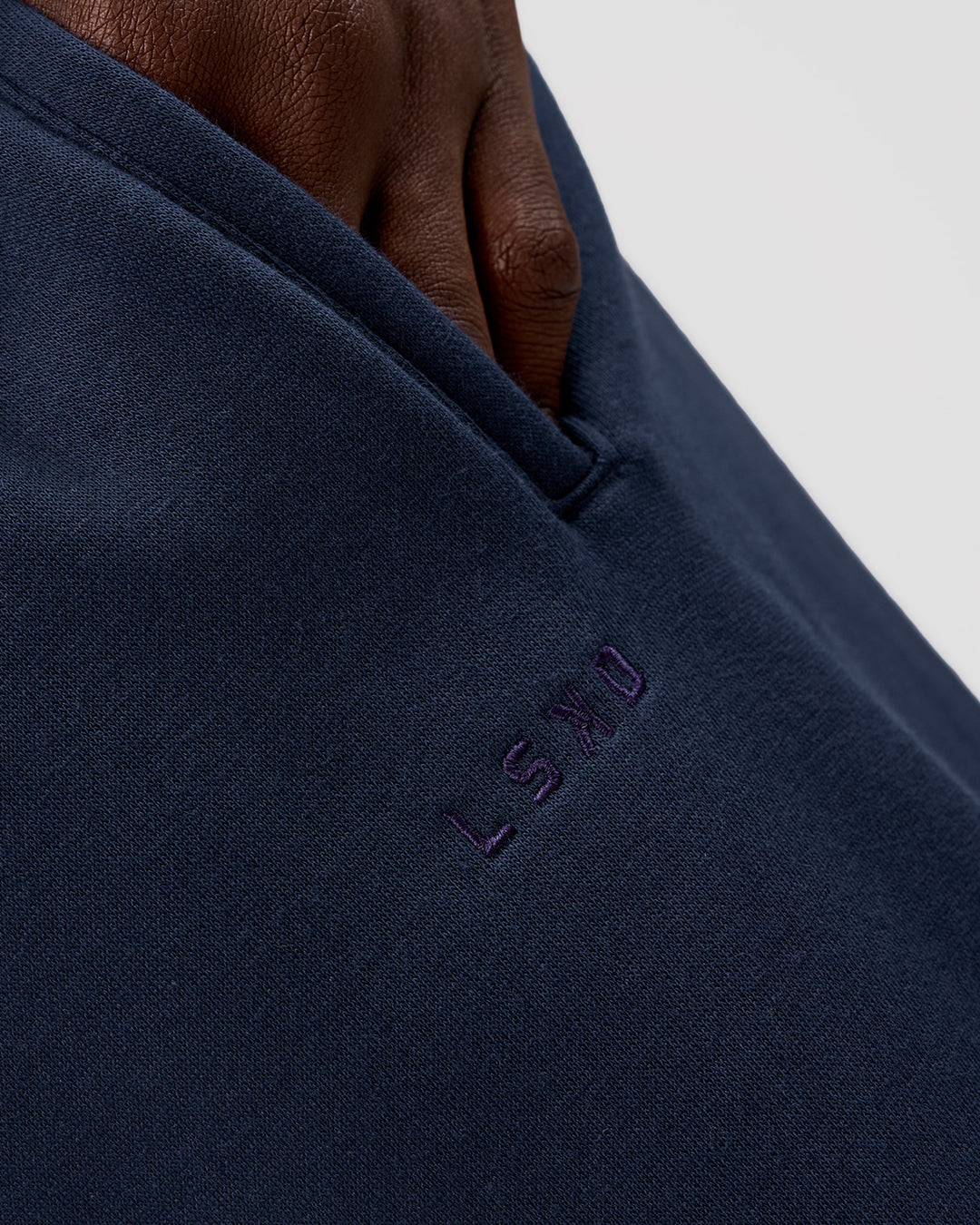 Man wearing MVP Cuffed Track Pant - Future Navy | Model:Okello | Size:M - view 6