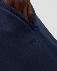 Man wearing MVP Cuffed Track Pant - Future Navy | Model:Okello | Size:M | Thumbnail Index: 5
