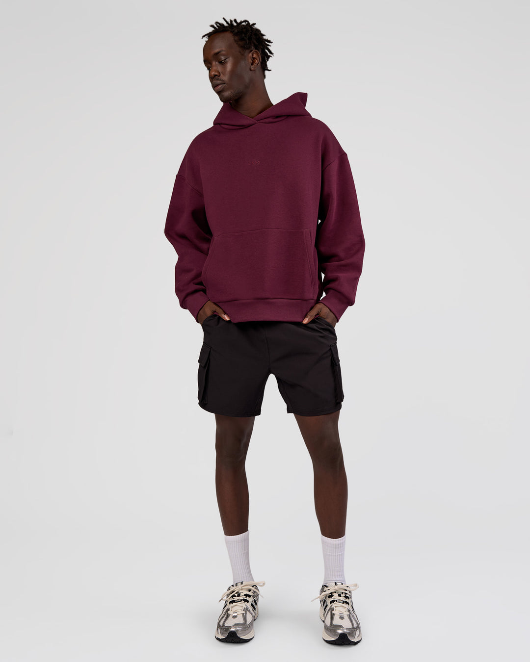 Man wearing MVP Oversized Hoodie - Cherry Lacquer | Model:Okello | Size:M - view 9