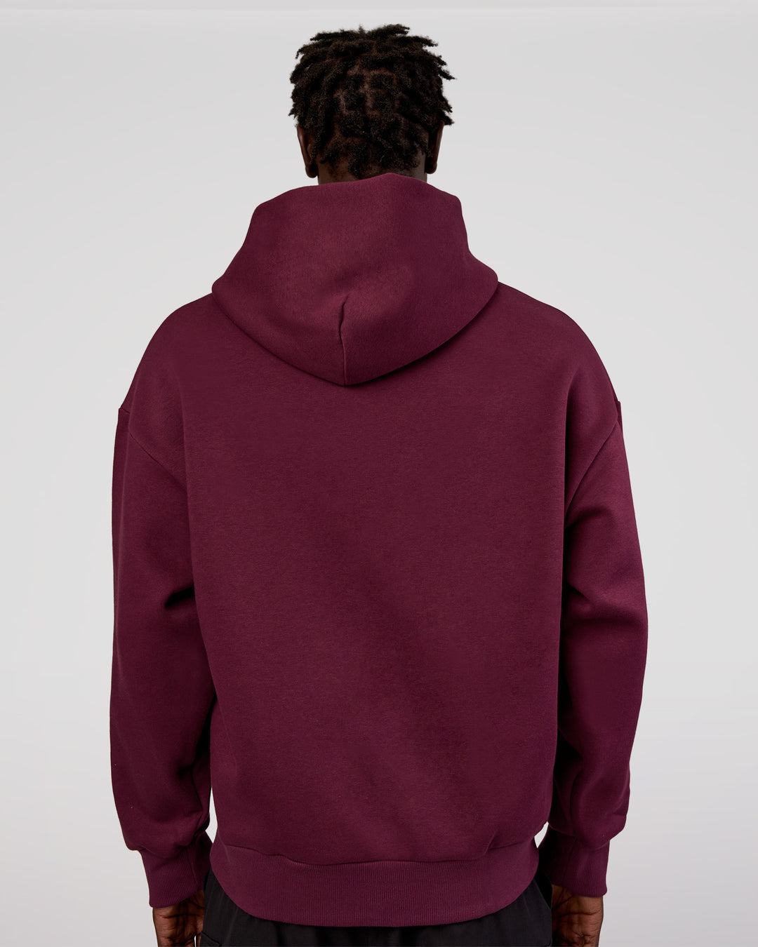 Man wearing MVP Oversized Hoodie - Cherry Lacquer | Model:Okello | Size:M - view 8